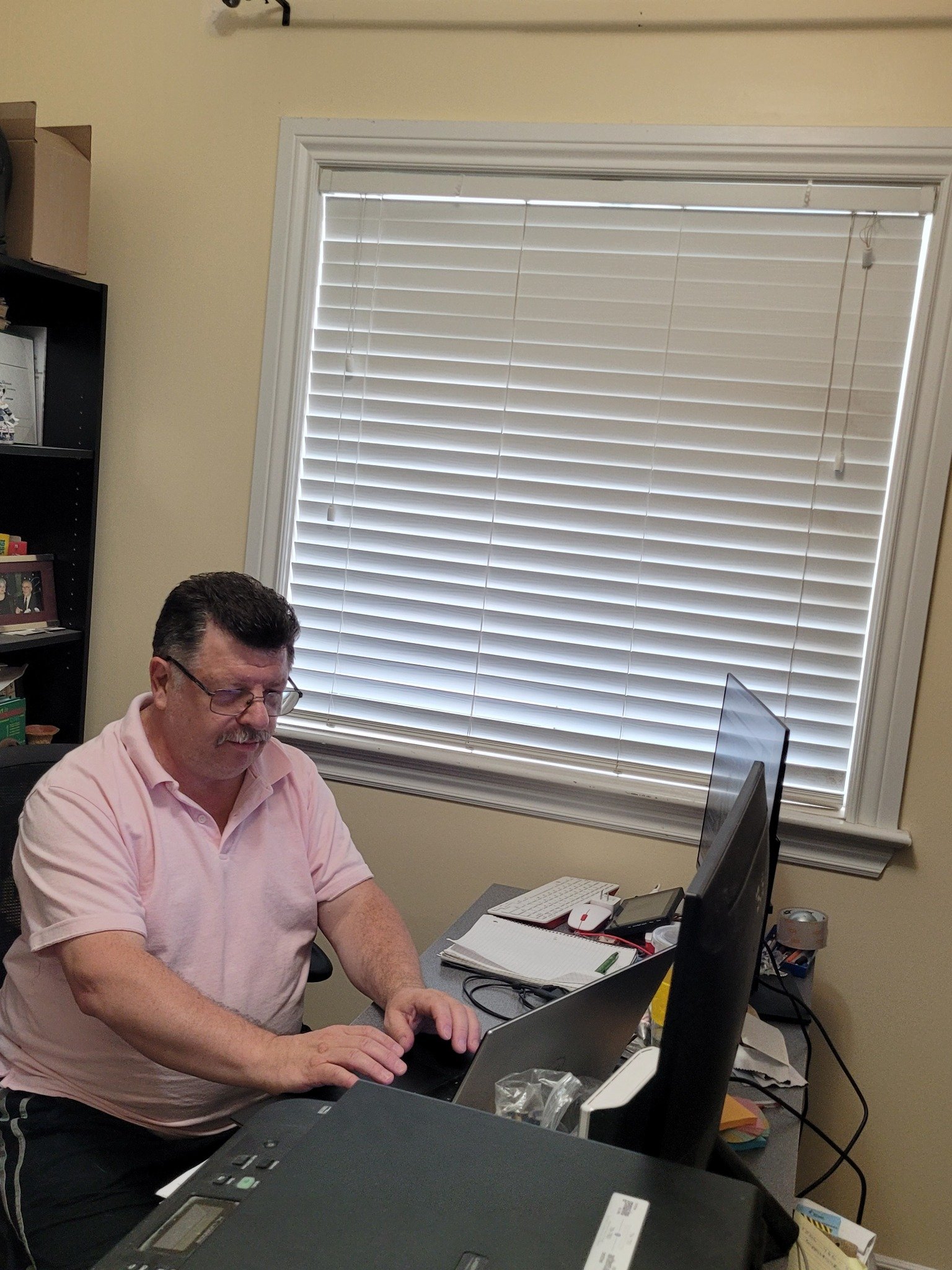 Greg Libenson working at his computer